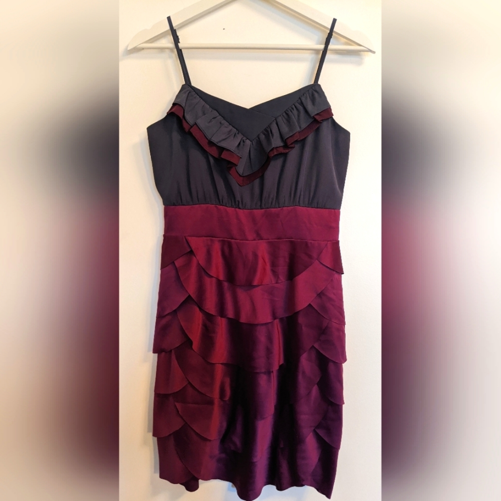 Grey and pink scalloped dress.